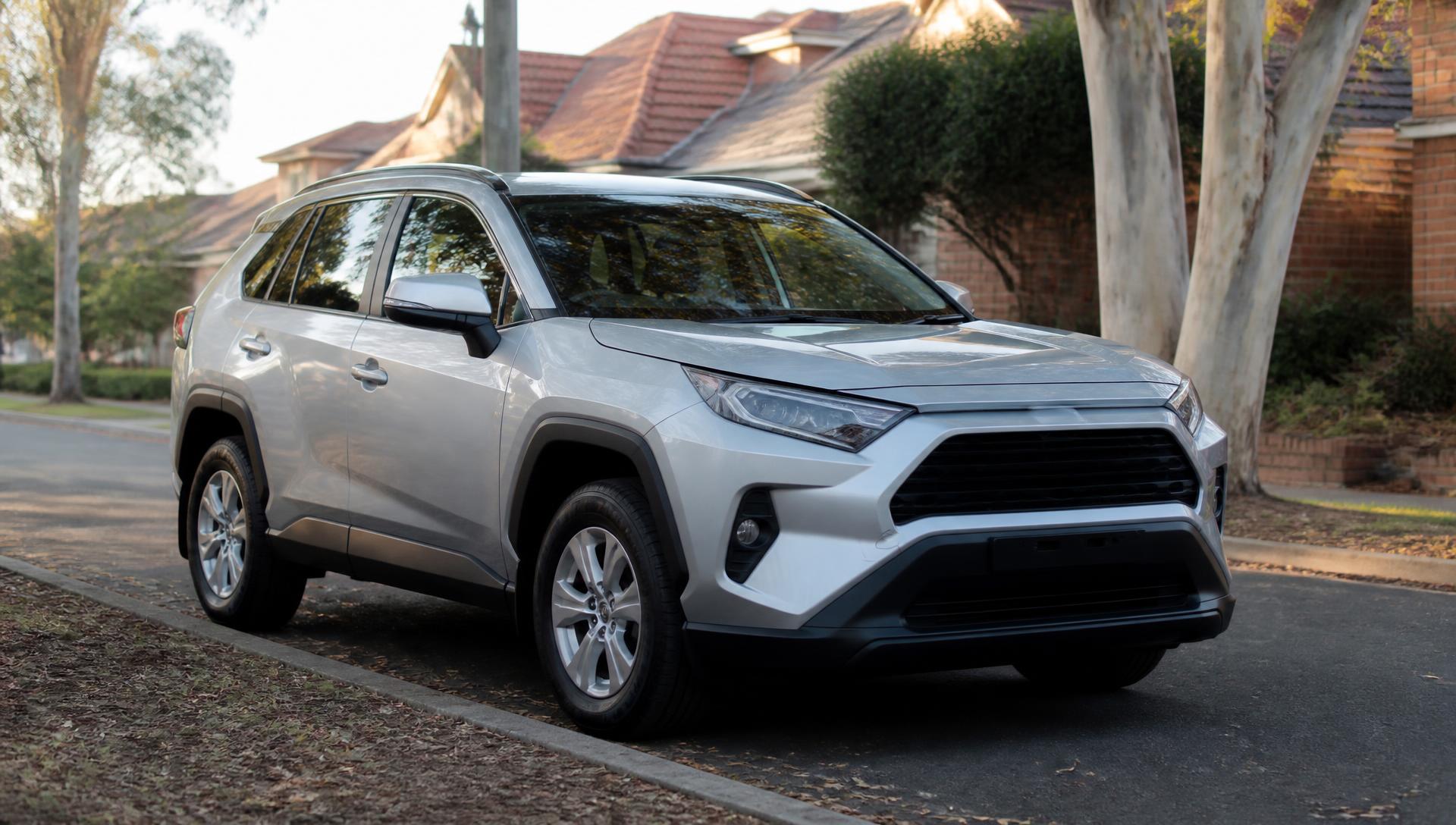 Silver Toyota RAV4 SUV parked on a leafy Australian suburban street